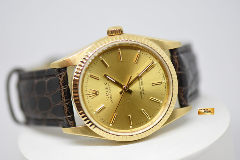 products/GML2396_-_Rolex_Oyster_Perpetual_34mm_Classic_18K_Yellow_Gold_14238_-_10.jpg
