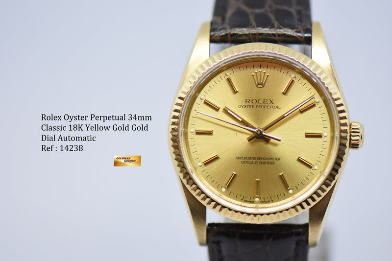 products/GML2396_-_Rolex_Oyster_Perpetual_34mm_Classic_18K_Yellow_Gold_14238_-_11.jpg