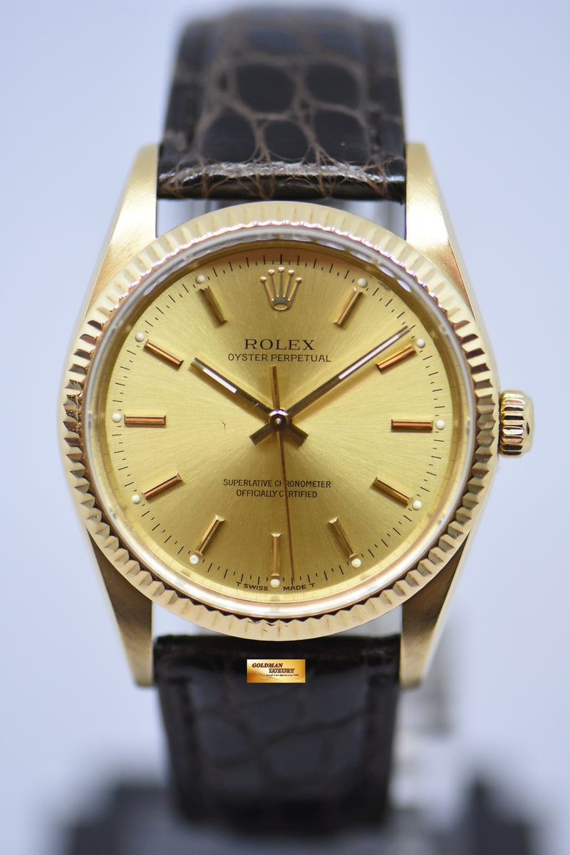 products/GML2396_-_Rolex_Oyster_Perpetual_34mm_Classic_18K_Yellow_Gold_14238_-_1.jpg