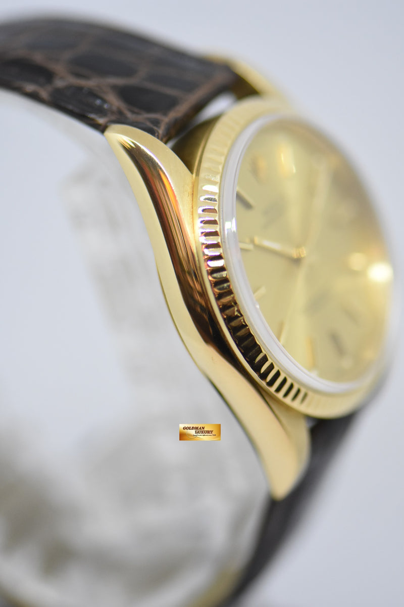 products/GML2396_-_Rolex_Oyster_Perpetual_34mm_Classic_18K_Yellow_Gold_14238_-_4.jpg
