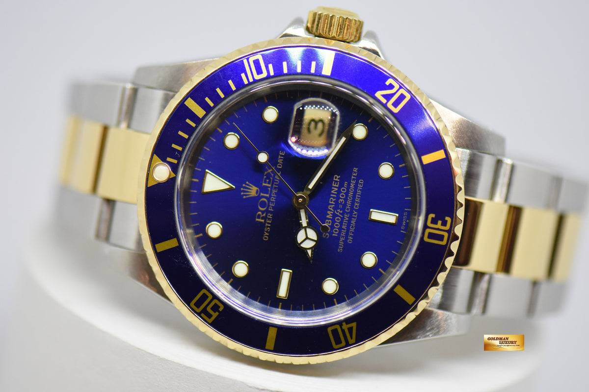 [SOLD] ROLEX OYSTER PERPETUAL SUBMARINER SUNBURST BLUE 40mm HALF-GOLD IN BRACELET 16613LB (MINT)