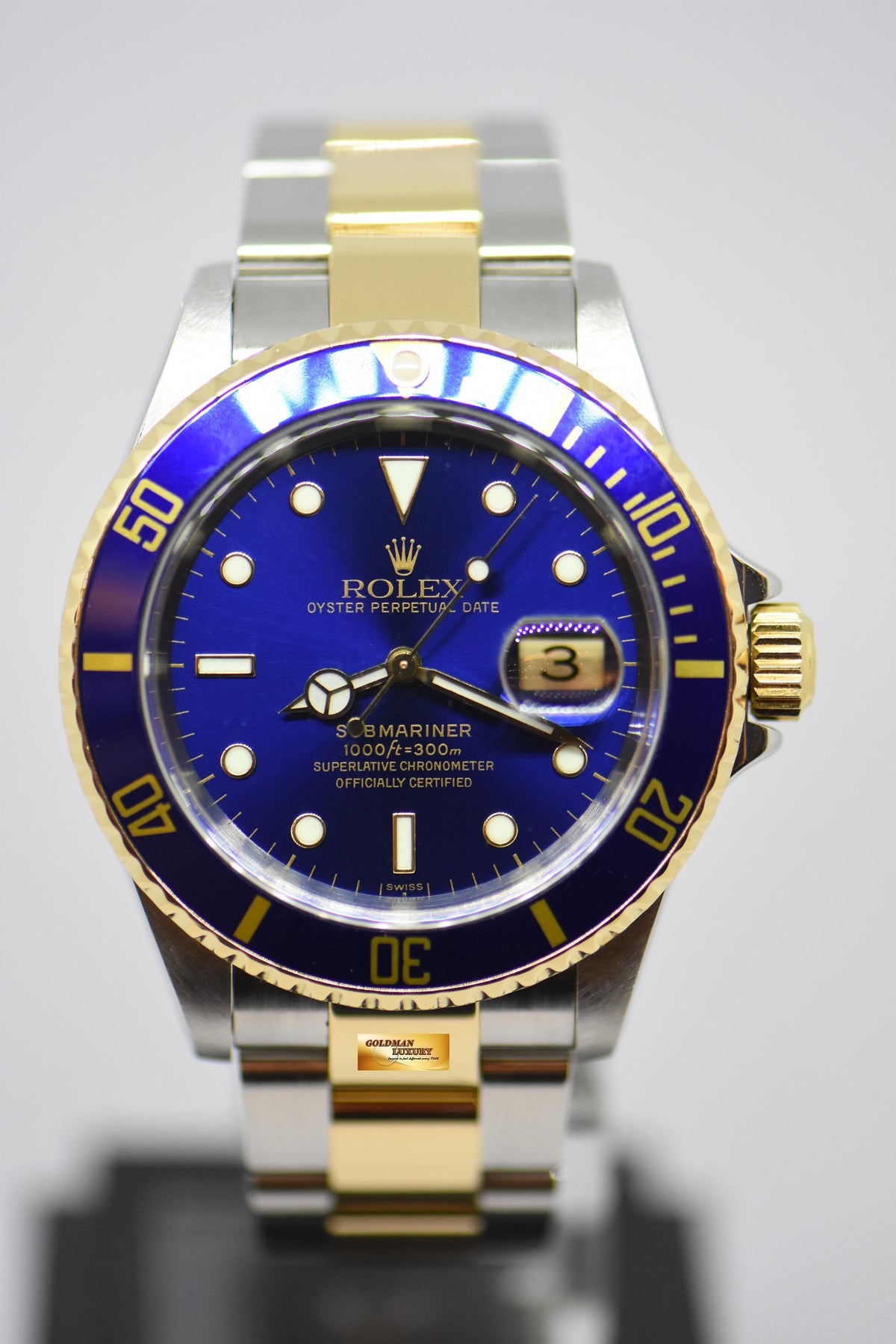 [SOLD] ROLEX OYSTER PERPETUAL SUBMARINER SUNBURST BLUE 40mm HALF-GOLD IN BRACELET 16613LB (MINT)