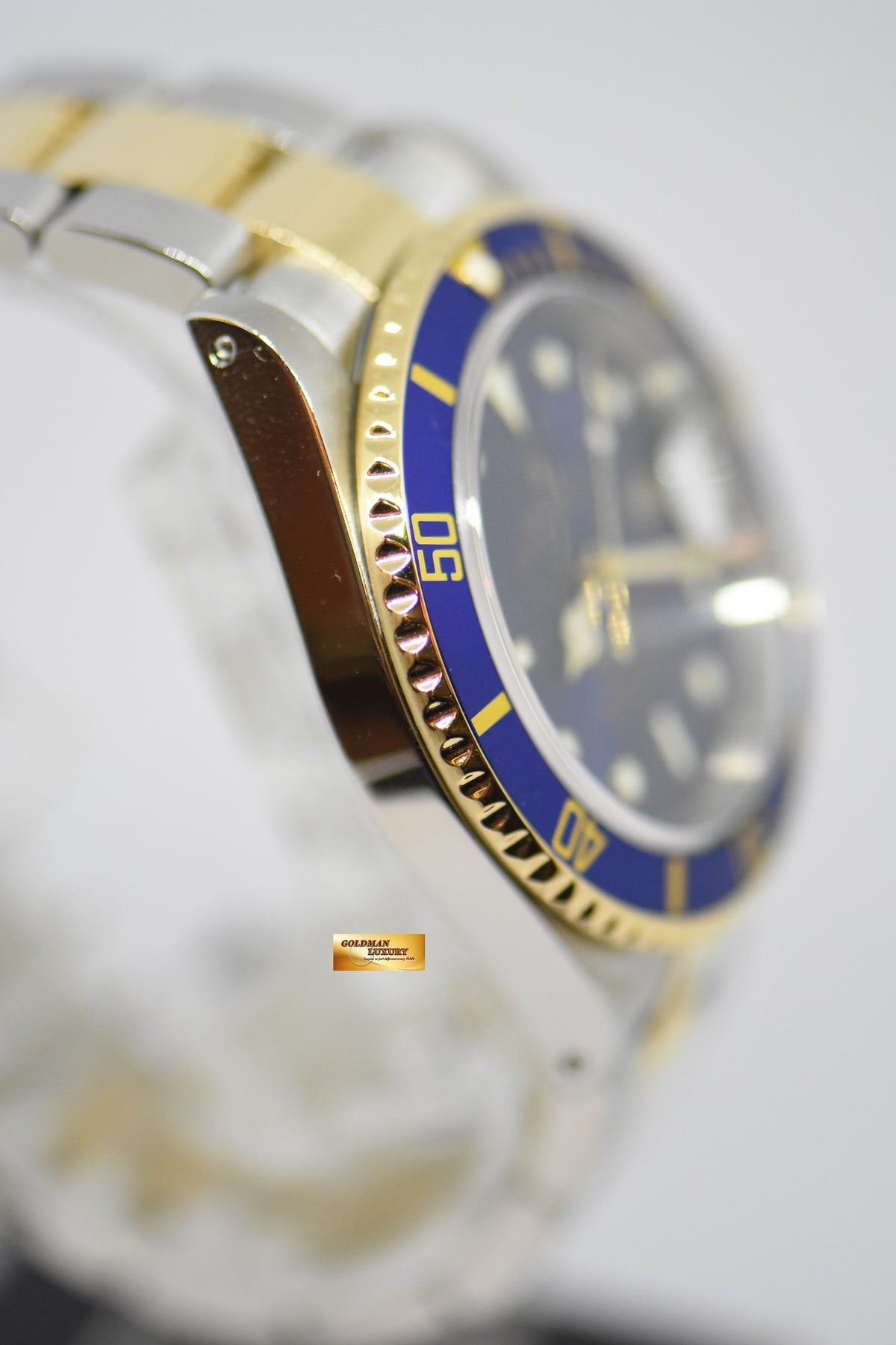 [SOLD] ROLEX OYSTER PERPETUAL SUBMARINER SUNBURST BLUE 40mm HALF-GOLD IN BRACELET 16613LB (MINT)