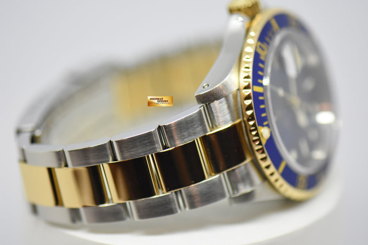 [SOLD] ROLEX OYSTER PERPETUAL SUBMARINER SUNBURST BLUE 40mm HALF-GOLD IN BRACELET 16613LB (MINT)