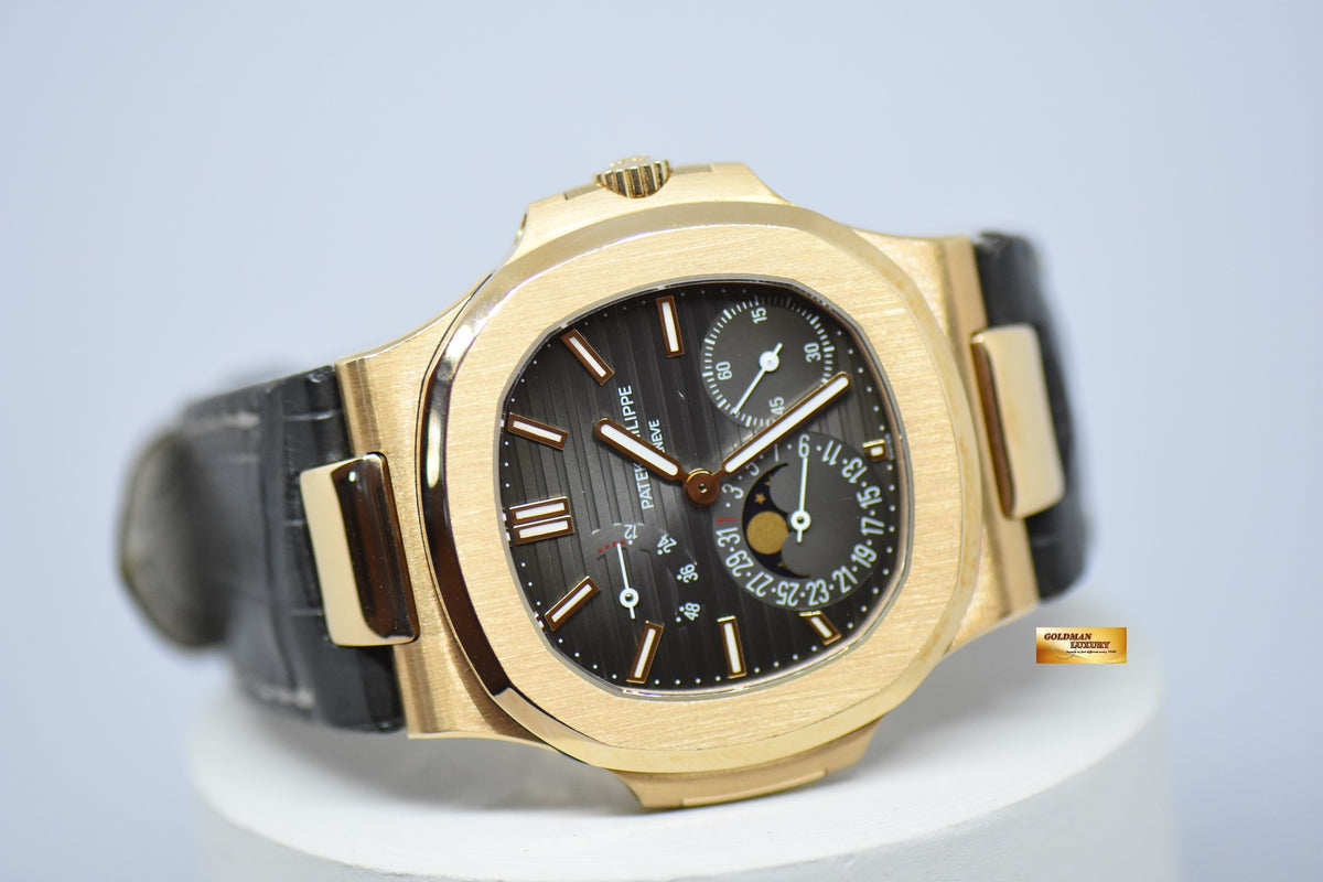 [SOLD] PATEK PHILIPPE NAUTILUS 18K ROSE GOLD IN LEATHER STRAP POWER RESERVE MOONPHASE 5712R (MINT)