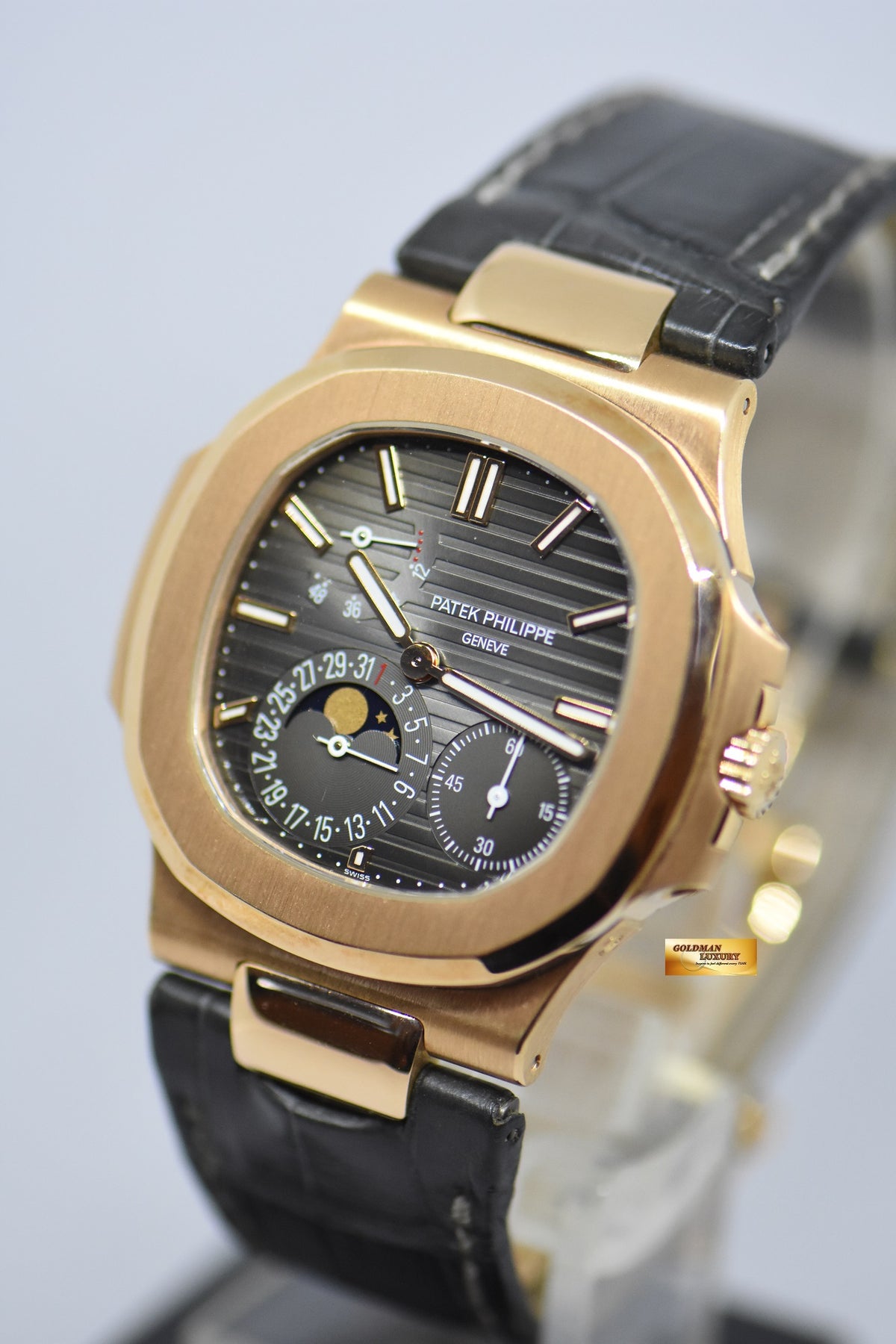 [SOLD] PATEK PHILIPPE NAUTILUS 18K ROSE GOLD IN LEATHER STRAP POWER RESERVE MOONPHASE 5712R (MINT)