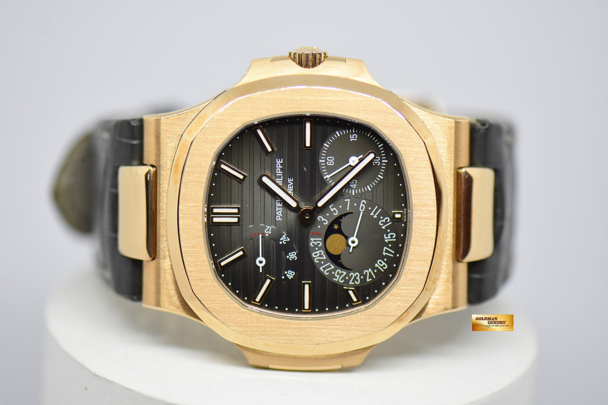 [SOLD] PATEK PHILIPPE NAUTILUS 18K ROSE GOLD IN LEATHER STRAP POWER RESERVE MOONPHASE 5712R (MINT)