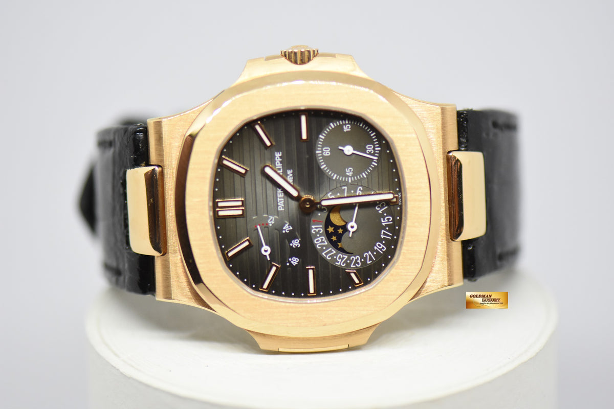 [SOLD] PATEK PHILIPPE NAUTILUS 18K ROSE GOLD IN LEATHER STRAP POWER RESERVE MOONPHASE 5712R (MINT)
