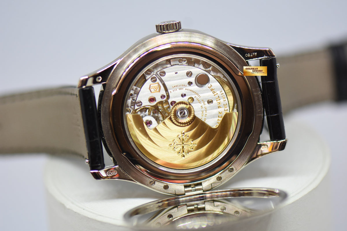 [SOLD] PATEK PHILIPPE CALATRAVA DATE 39mm WHITE GOLD HINGED-BACK DUST COVER IN LEATHER STRAP AUTOMATIC 5227G (MINT)