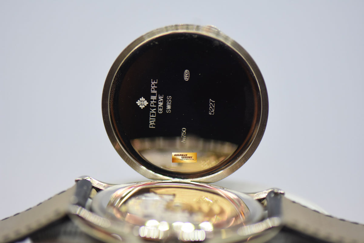 [SOLD] PATEK PHILIPPE CALATRAVA DATE 39mm WHITE GOLD HINGED-BACK DUST COVER IN LEATHER STRAP AUTOMATIC 5227G (MINT)