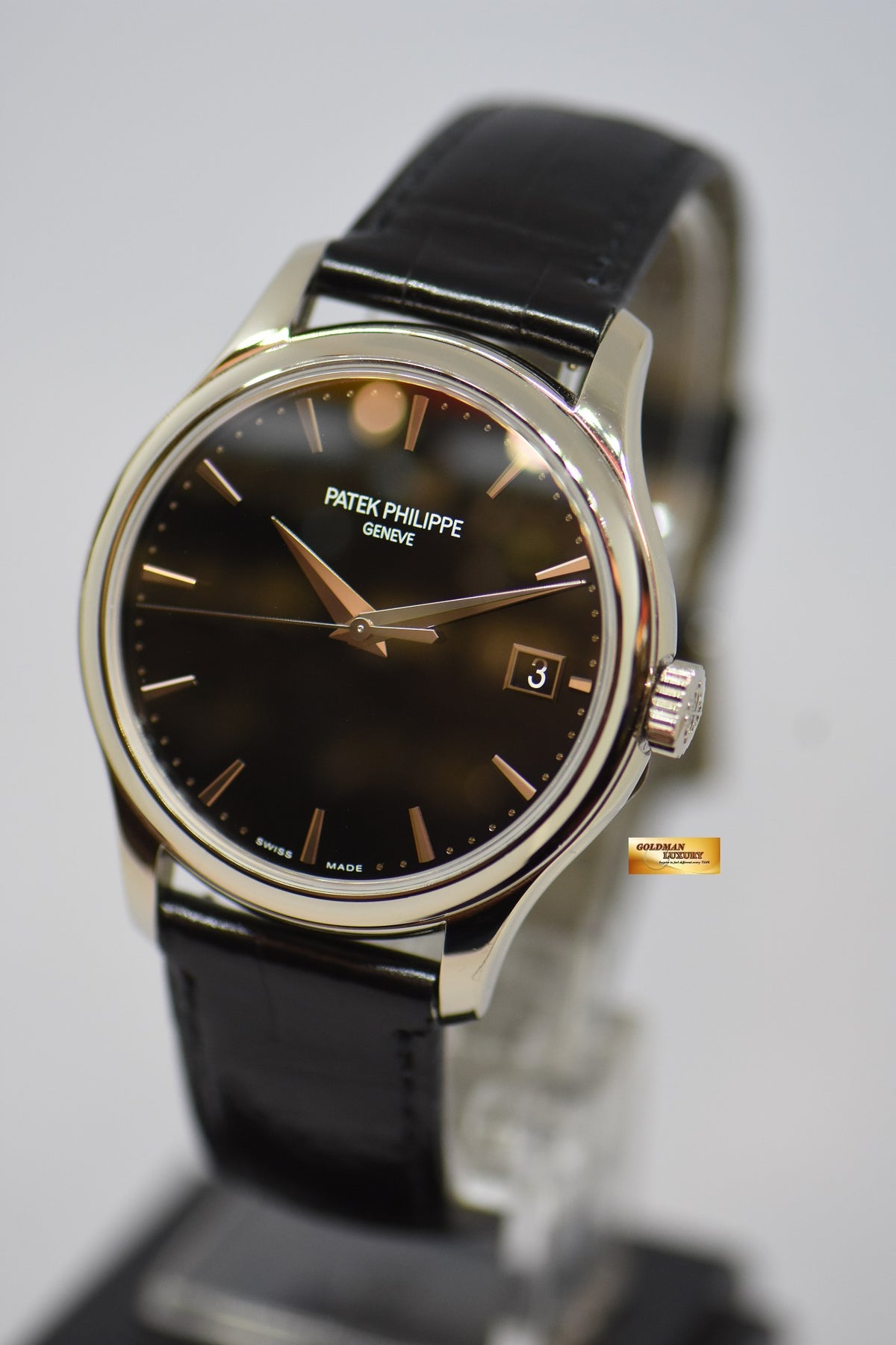 [SOLD] PATEK PHILIPPE CALATRAVA DATE 39mm WHITE GOLD HINGED-BACK DUST COVER IN LEATHER STRAP AUTOMATIC 5227G (MINT)