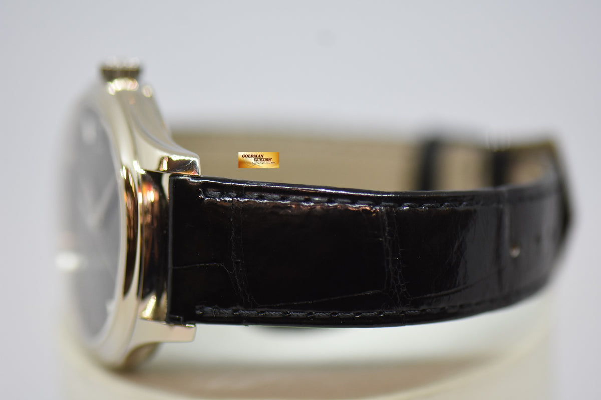 [SOLD] PATEK PHILIPPE CALATRAVA DATE 39mm WHITE GOLD HINGED-BACK DUST COVER IN LEATHER STRAP AUTOMATIC 5227G (MINT)