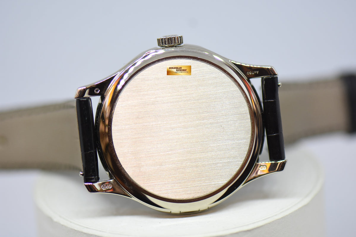 [SOLD] PATEK PHILIPPE CALATRAVA DATE 39mm WHITE GOLD HINGED-BACK DUST COVER IN LEATHER STRAP AUTOMATIC 5227G (MINT)