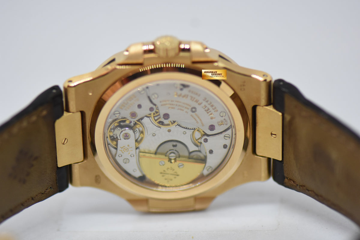 [SOLD] PATEK PHILIPPE NAUTILUS 40mm 18K ROSE GOLD IN LEATHER STRAP POWER RESERVE MOONPHASE COMPLICATION AUTOMATIC 5712R (MINT)