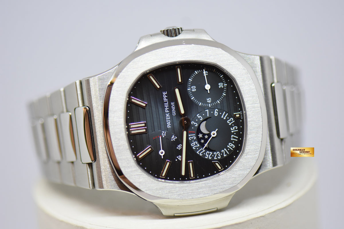 [SOLD] PATEK PHILIPPE NAUTILUS 40mm STAINLESS STEEL IN BRACELET POWER RESERVE MOONPHASE COMPLICATION AUTOMATIC 5712A-001 (MINT)