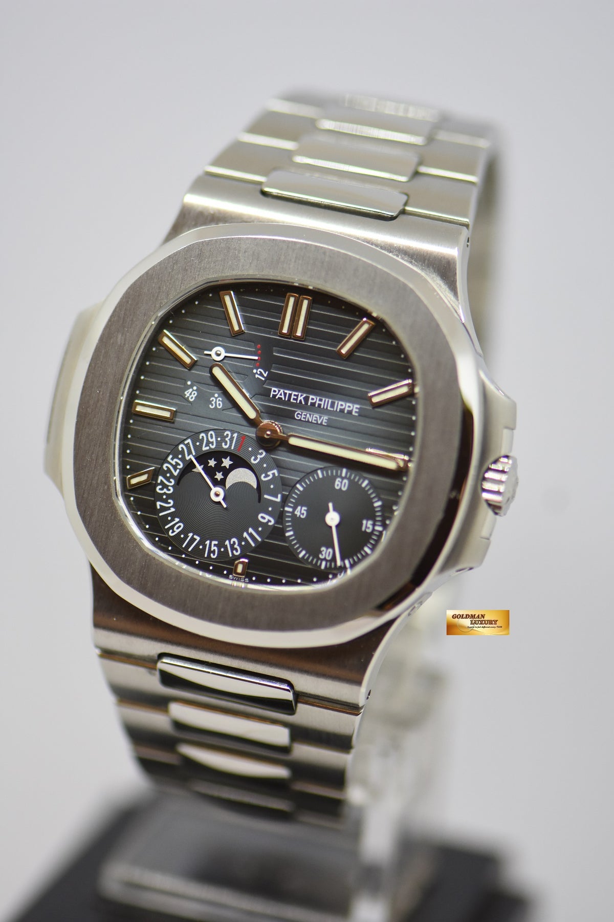 [SOLD] PATEK PHILIPPE NAUTILUS 40mm STAINLESS STEEL IN BRACELET POWER RESERVE MOONPHASE COMPLICATION AUTOMATIC 5712A-001 (MINT)