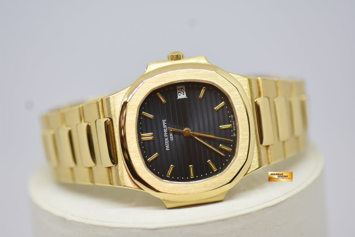 [SOLD] PATEK PHILIPPE NAUTILUS LADIES 33mm 18K YELLOW GOLD IN BRACELET BLUE SIGMA DIAL QUARTZ 3900 (MINT)