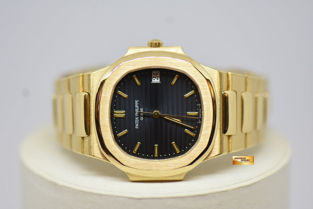[SOLD] PATEK PHILIPPE NAUTILUS LADIES 33mm 18K YELLOW GOLD IN BRACELET BLUE SIGMA DIAL QUARTZ 3900 (MINT)