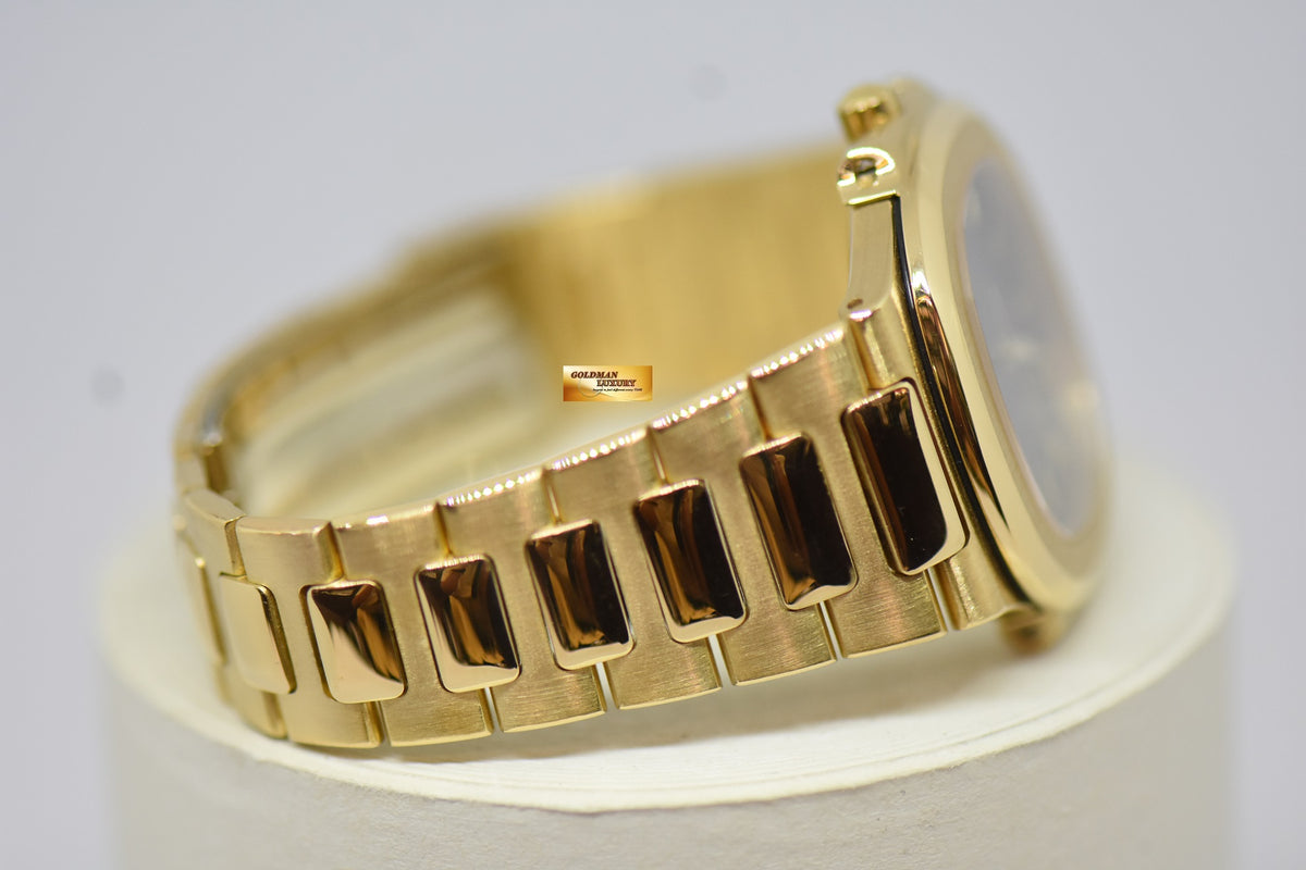 [SOLD] PATEK PHILIPPE NAUTILUS LADIES 33mm 18K YELLOW GOLD IN BRACELET BLUE SIGMA DIAL QUARTZ 3900 (MINT)