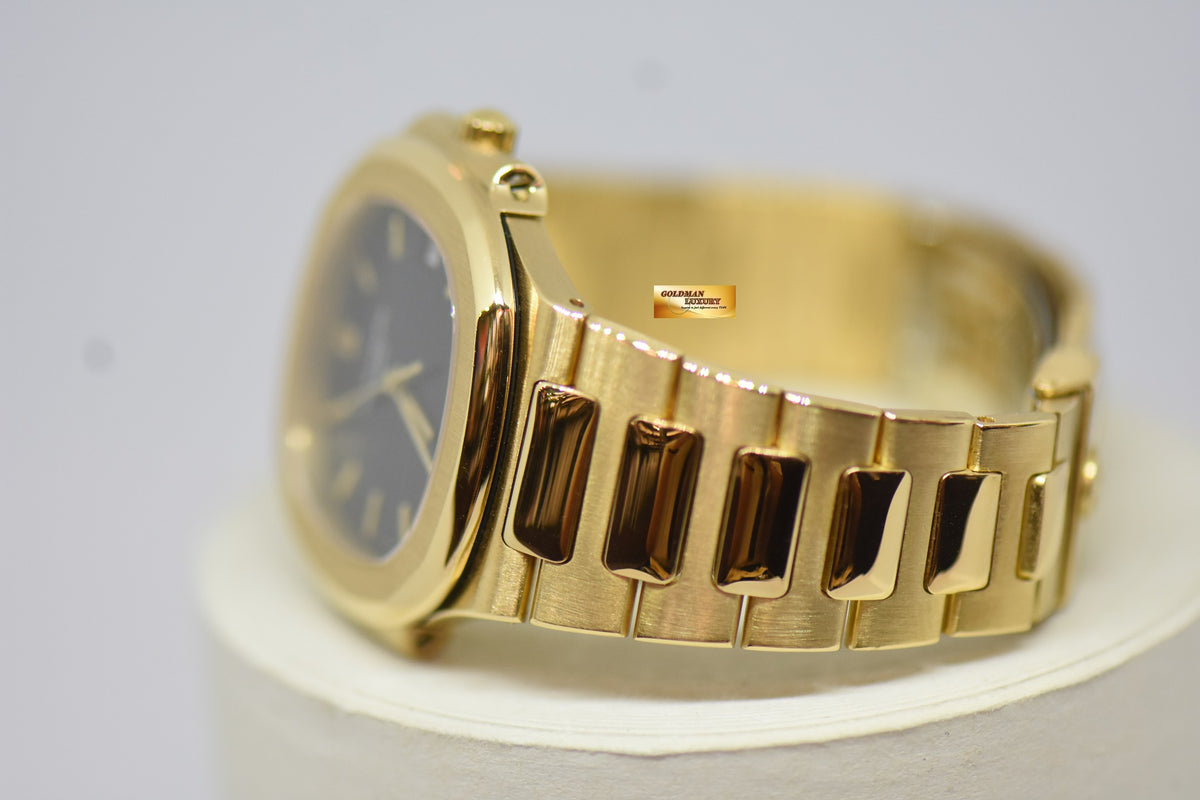 [SOLD] PATEK PHILIPPE NAUTILUS LADIES 33mm 18K YELLOW GOLD IN BRACELET BLUE SIGMA DIAL QUARTZ 3900 (MINT)