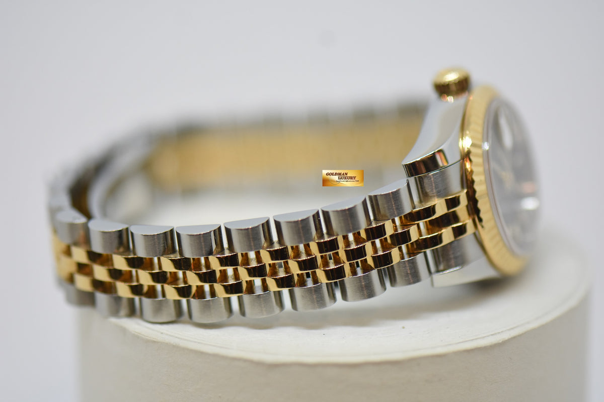 [SOLD] ROLEX OYSTER DATEJUST 26mm GOLD / STEEL IN JUBILEE BRACELET BLACK DIAL 179173 (MINT)