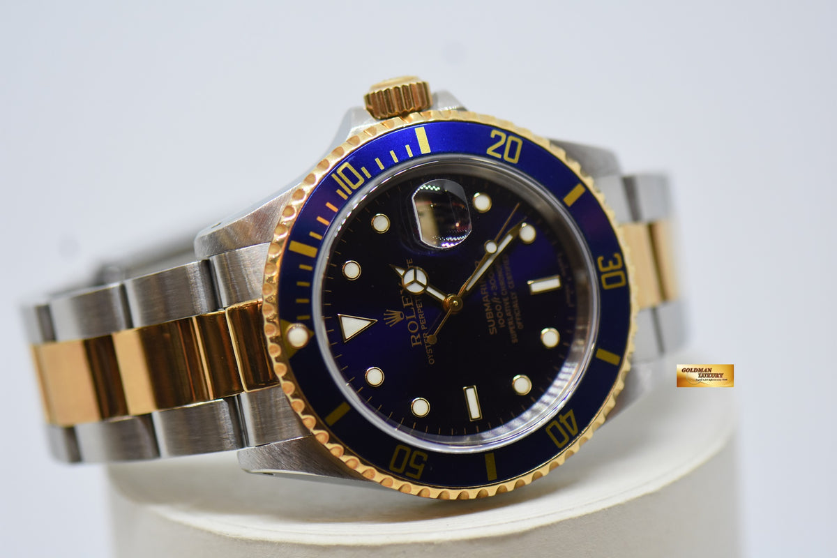 [SOLD] ROLEX OYSTER SUBMARINER 40mm GOLD / STEEL IN BRACELET BLUE DIAL & BEZEL 16613LB (PURPLISH AGING DIAL)