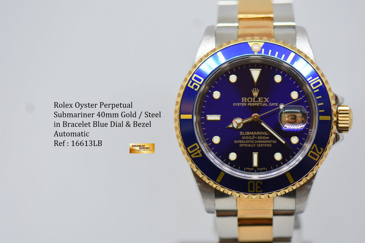 [SOLD] ROLEX OYSTER SUBMARINER 40mm GOLD / STEEL IN BRACELET BLUE DIAL & BEZEL 16613LB (PURPLISH AGING DIAL)