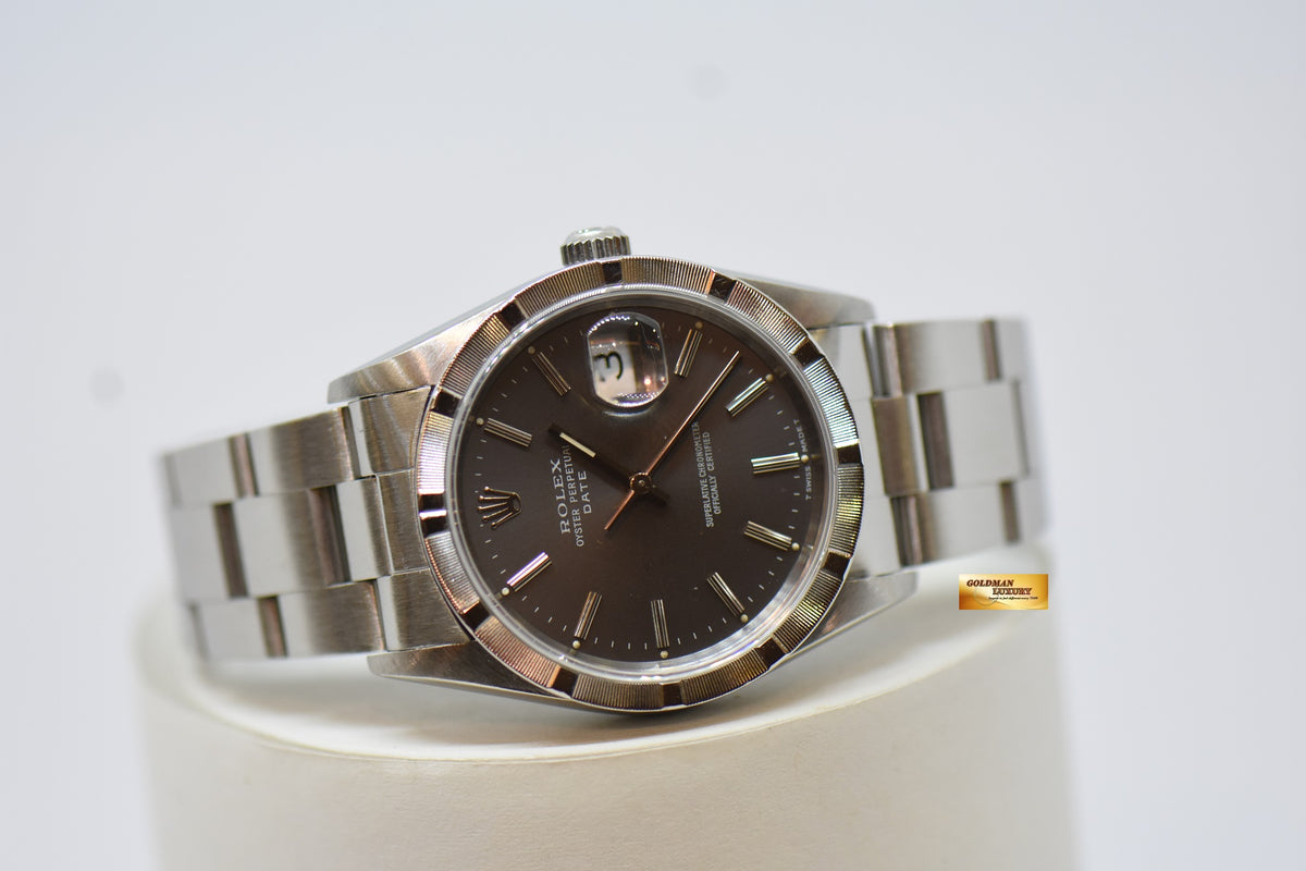 [SOLD] ROLEX OYSTER PERPETUAL DATE 34mm STEEL IN BRACELET GREY DIAL “STEEL ENGINE-TURNED” BEZEL 15210 (MINT)