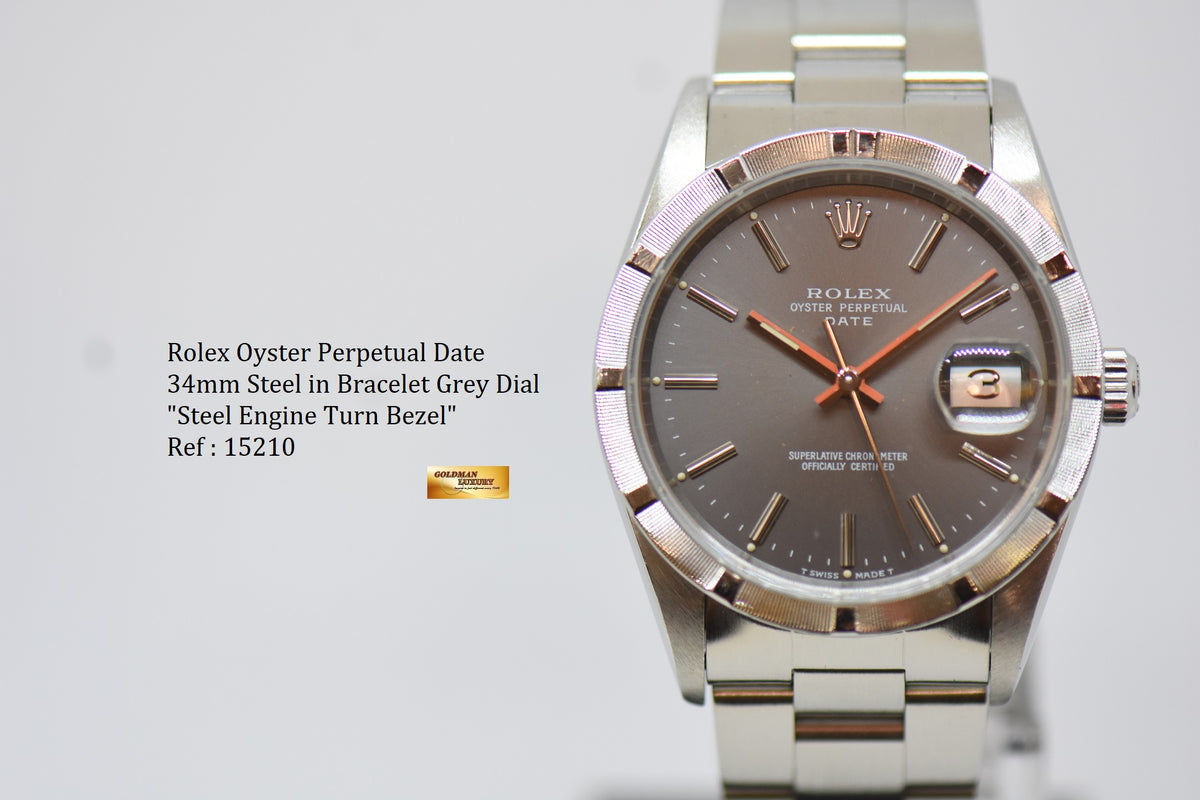 [SOLD] ROLEX OYSTER PERPETUAL DATE 34mm STEEL IN BRACELET GREY DIAL “STEEL ENGINE-TURNED” BEZEL 15210 (MINT)