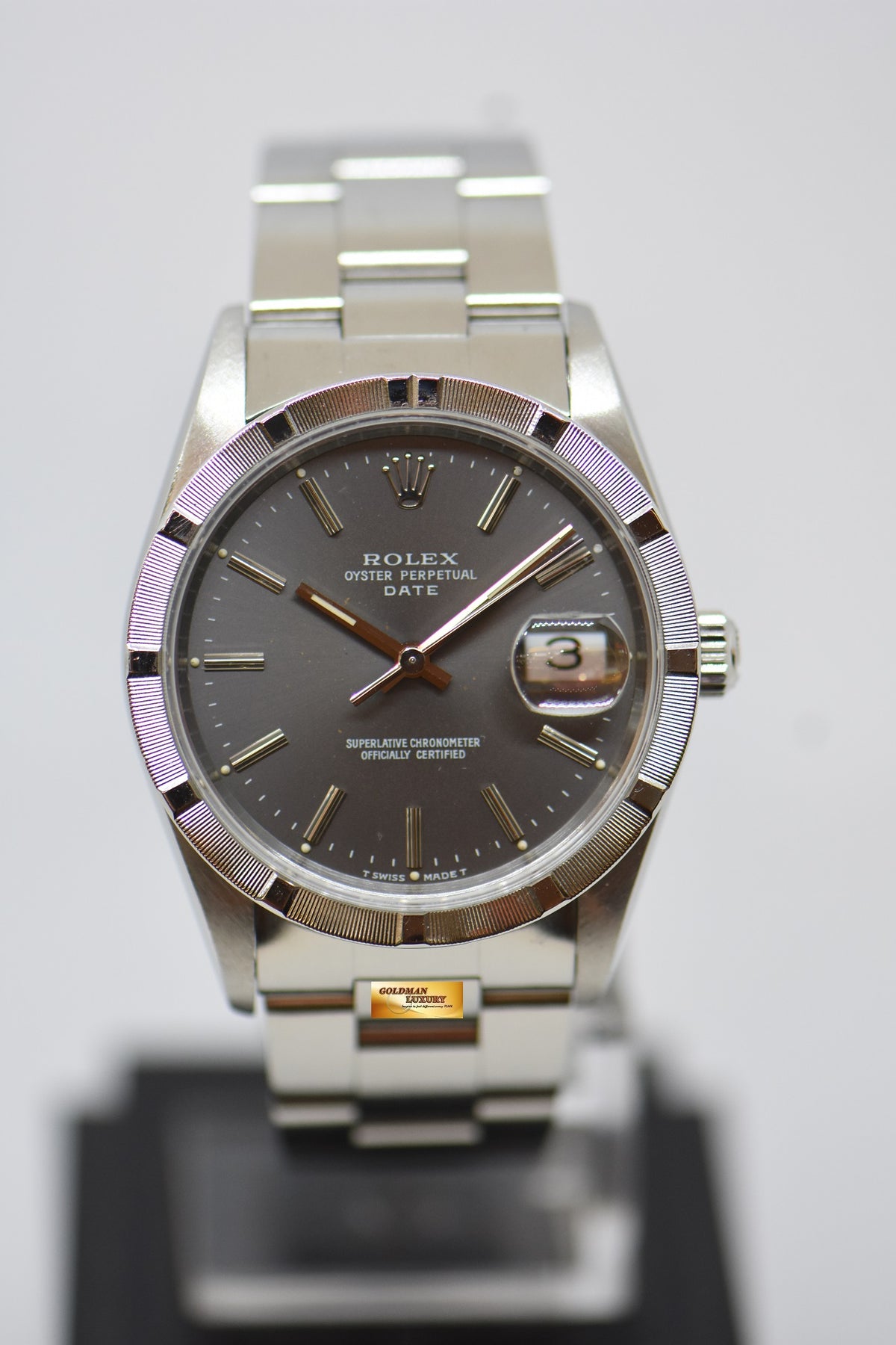 [SOLD] ROLEX OYSTER PERPETUAL DATE 34mm STEEL IN BRACELET GREY DIAL “STEEL ENGINE-TURNED” BEZEL 15210 (MINT)