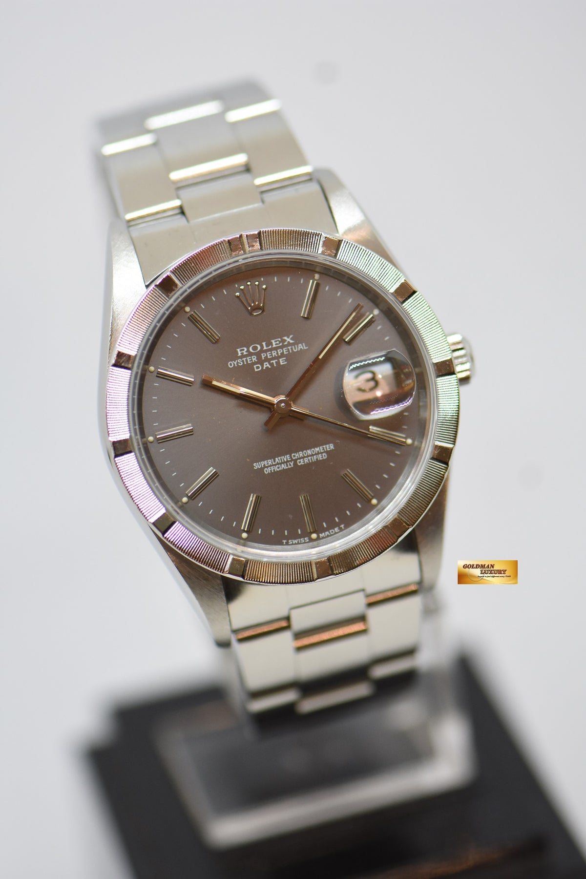 [SOLD] ROLEX OYSTER PERPETUAL DATE 34mm STEEL IN BRACELET GREY DIAL “STEEL ENGINE-TURNED” BEZEL 15210 (MINT)