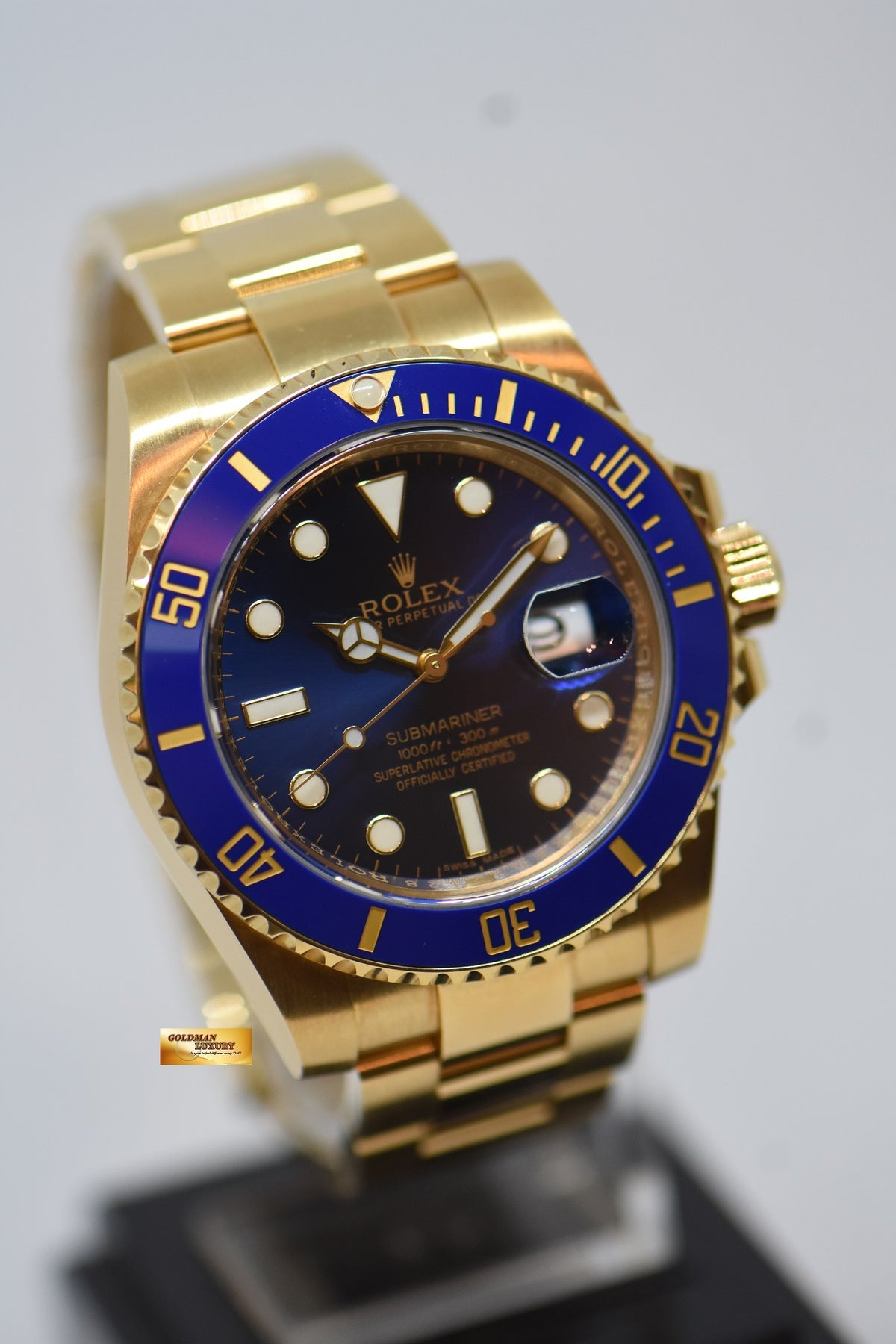 [SOLD] ROLEX OYSTER SUBMARINER 40mm YELLOW GOLD IN OYSTER BRACELET BLUE SUNBURST DIAL BLUE CERAMIC BEZEL 116618LB (UNPOLISHED)