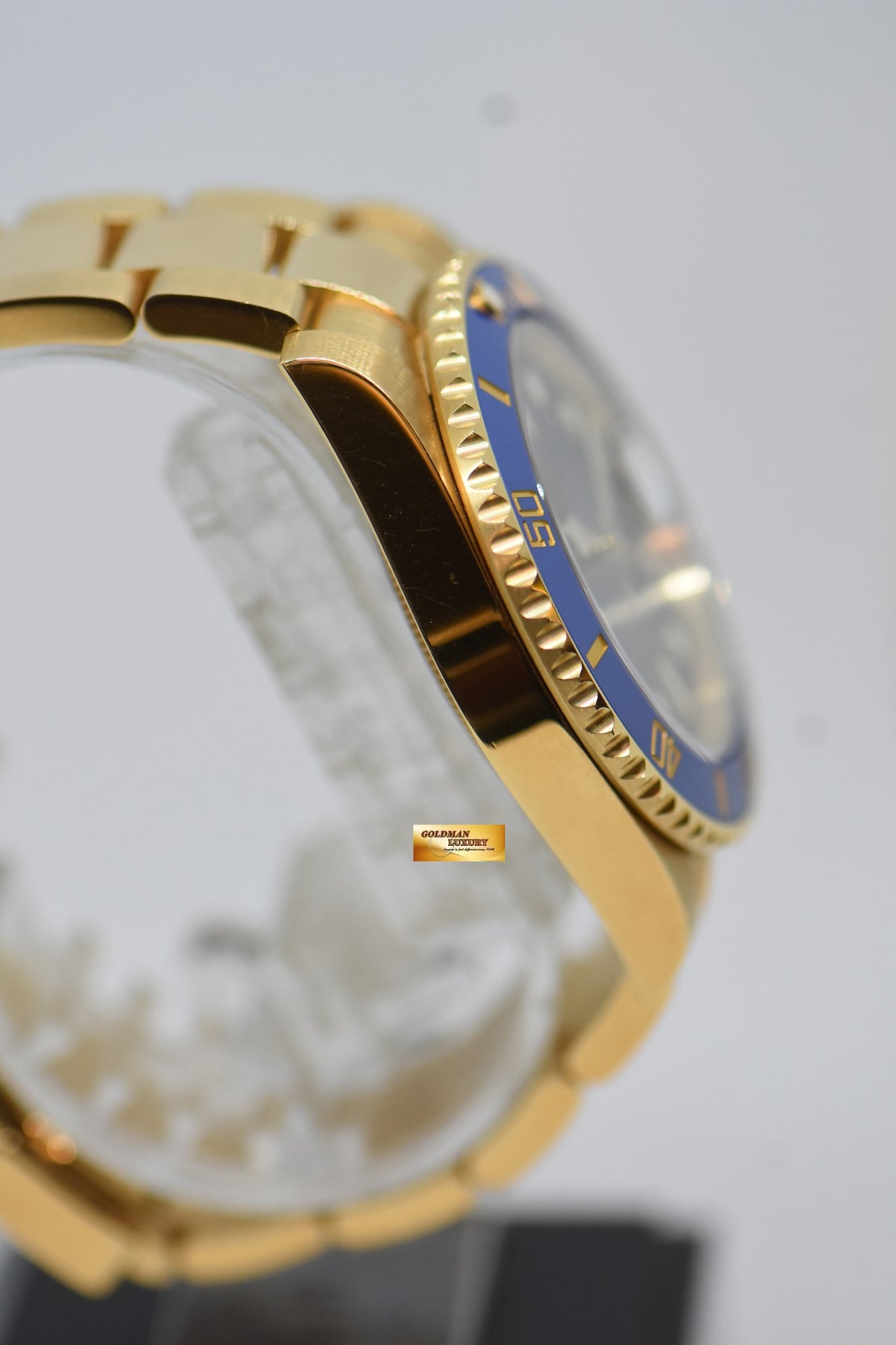 [SOLD] ROLEX OYSTER SUBMARINER 40mm YELLOW GOLD IN OYSTER BRACELET BLUE SUNBURST DIAL BLUE CERAMIC BEZEL 116618LB (UNPOLISHED)