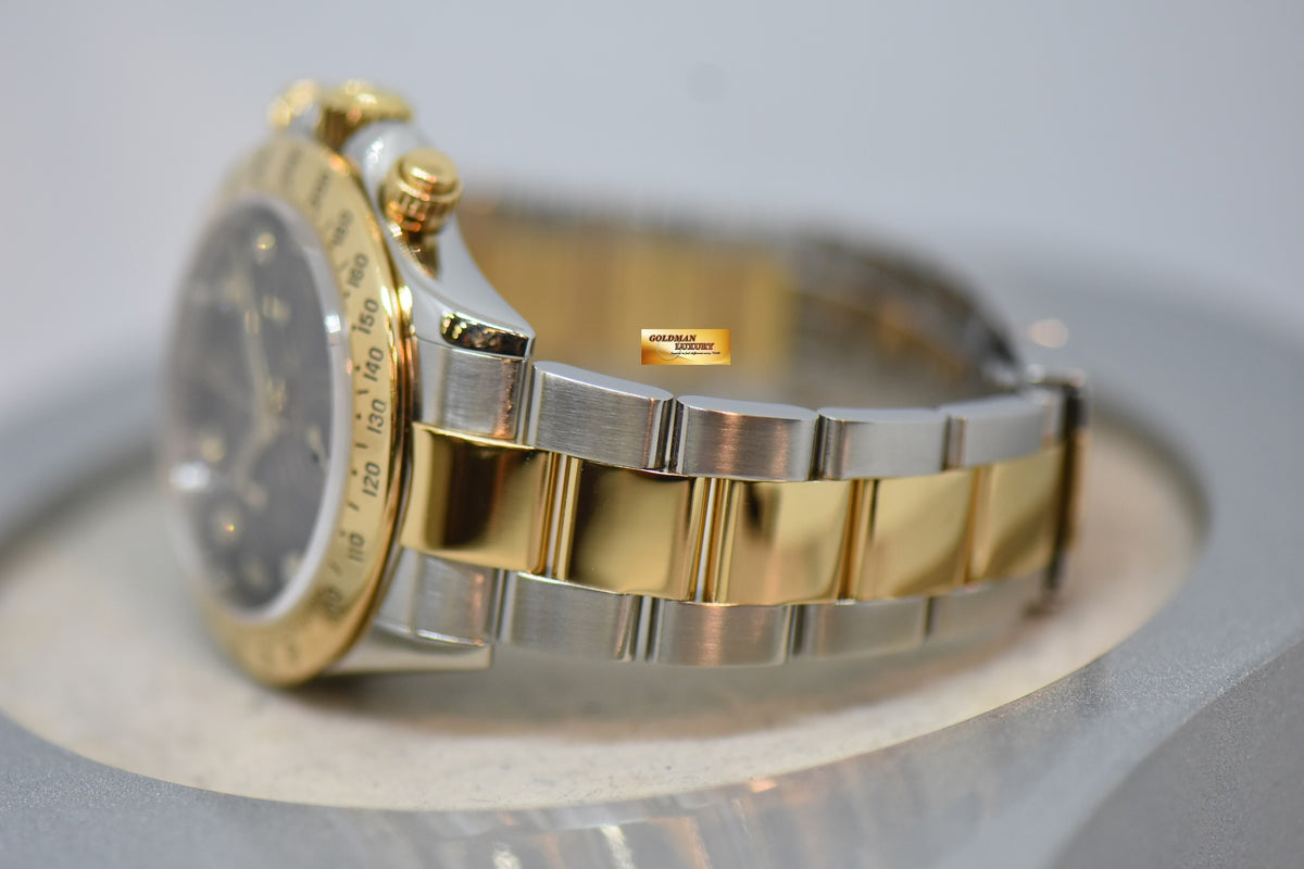[SOLD] ROLEX OYSTER PERPETUAL DAYTONA CHRONOGRAPH 40mm GOLD / STEEL IN OYSTER BRACELET BLACK DIAMOND DIAL 116523 (REHAUT ENGRAVINGS) (SHORT CLASP) (MINT)