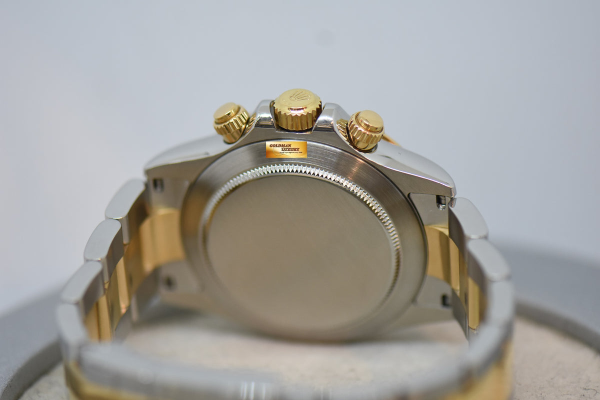 [SOLD] ROLEX OYSTER PERPETUAL DAYTONA CHRONOGRAPH 40mm GOLD / STEEL IN OYSTER BRACELET BLACK DIAMOND DIAL 116523 (REHAUT ENGRAVINGS) (SHORT CLASP) (MINT)