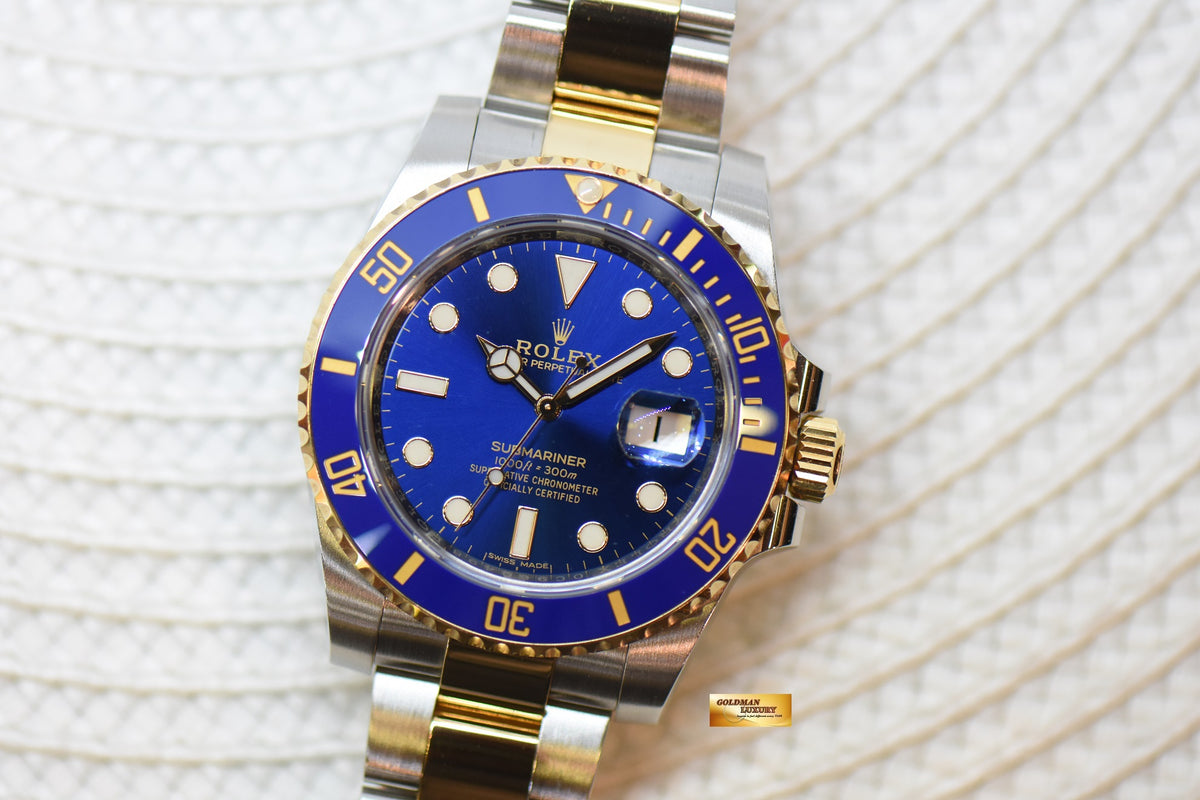 [SOLD] ROLEX OYSTER PERPETUAL SUBMARINER BLUE 40mm HALF-GOLD IN BRACELET SUNBURST BLUE CERAMIC BEZEL 116613LB (MINT)