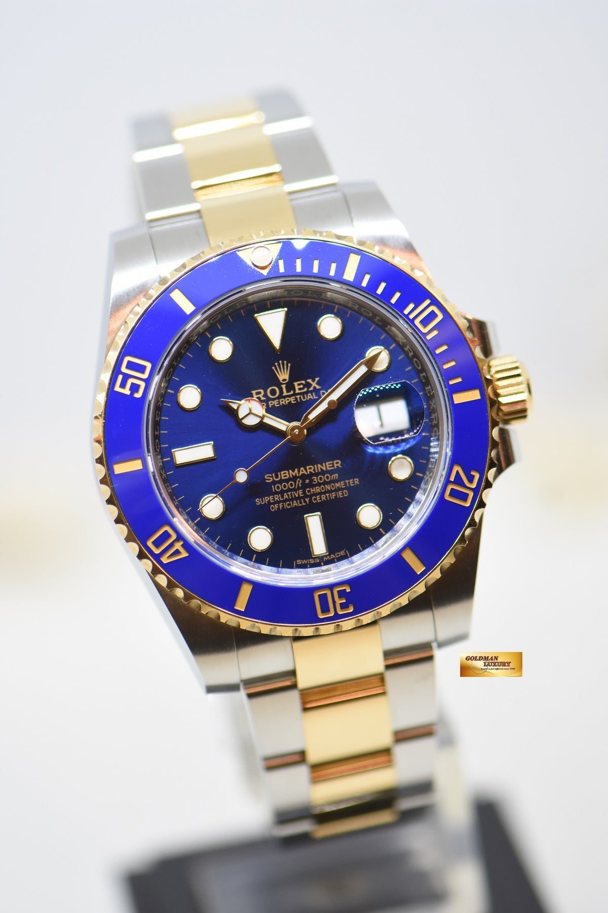 [SOLD] ROLEX OYSTER PERPETUAL SUBMARINER BLUE 40mm HALF-GOLD IN BRACELET SUNBURST BLUE CERAMIC BEZEL 116613LB (MINT)