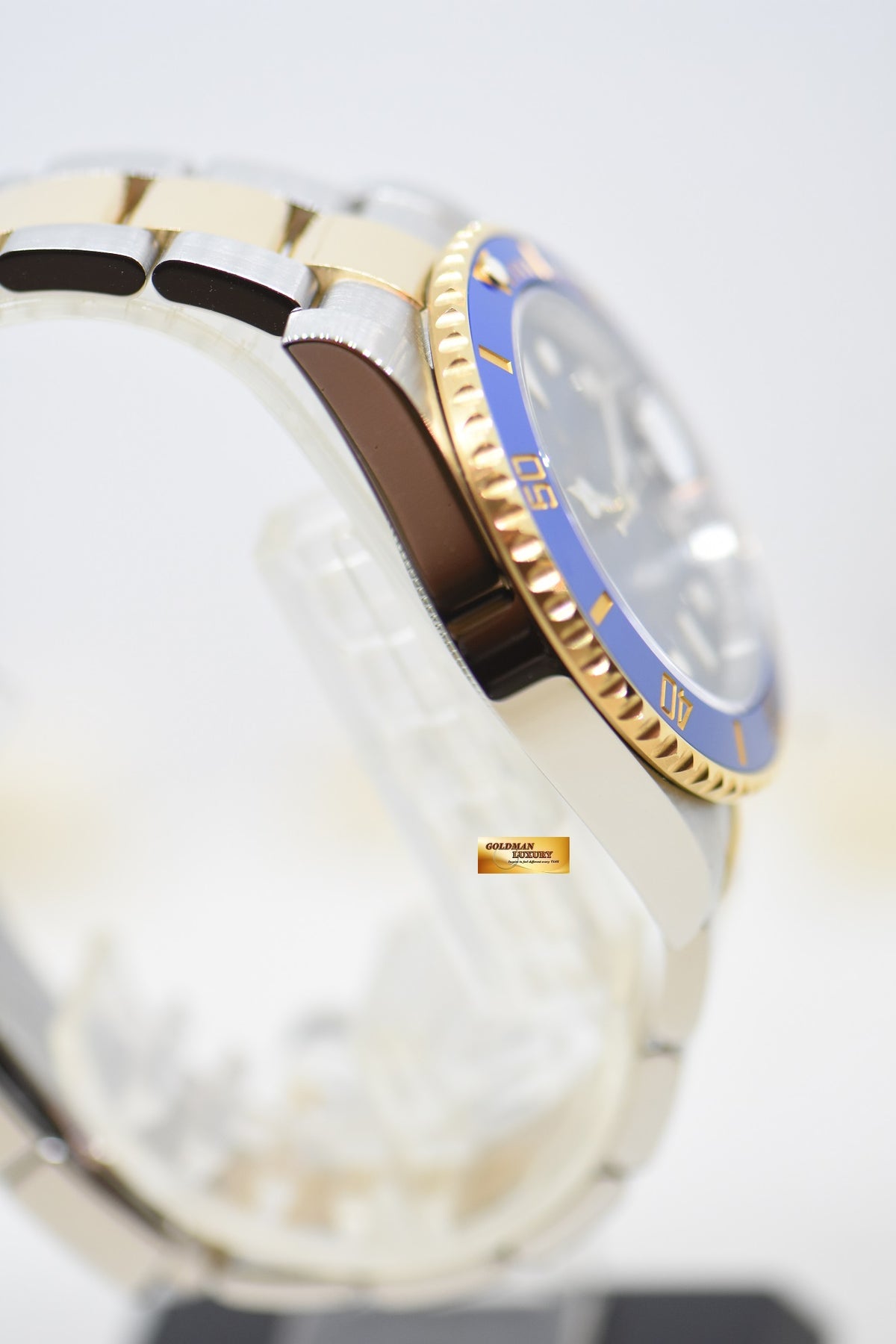 [SOLD] ROLEX OYSTER PERPETUAL SUBMARINER BLUE 40mm HALF-GOLD IN BRACELET SUNBURST BLUE CERAMIC BEZEL 116613LB (MINT)