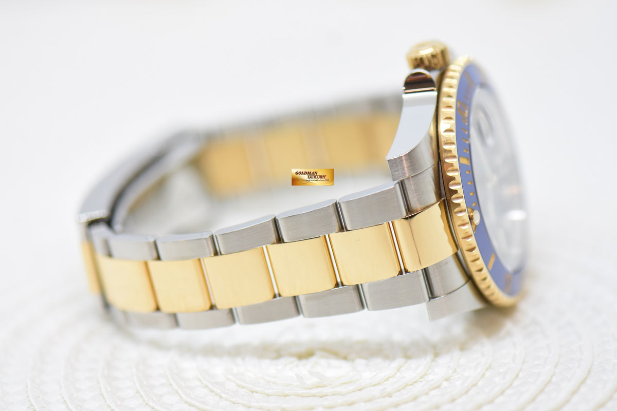 [SOLD] ROLEX OYSTER PERPETUAL SUBMARINER BLUE 40mm HALF-GOLD IN BRACELET SUNBURST BLUE CERAMIC BEZEL 116613LB (MINT)