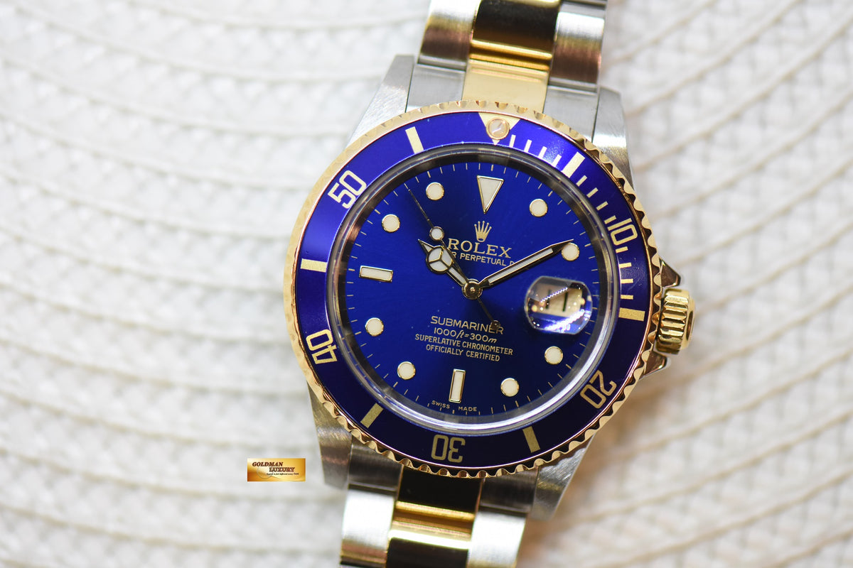[SOLD] ROLEX OYSTER PERPETUAL SUBMARINER GOLD / STEEL IN BRACELET BLUE DIAL 16613LB (NO PINHOLE-SOLID ENDLINKS) (MINT)