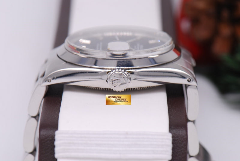 products/GML958_-_Rolex_Oyster_Perpetual_Date_Ref_1500_Black_Automatic_Near_Mint_-_4.JPG